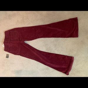 Maroon corduroy flare pants, brand new.